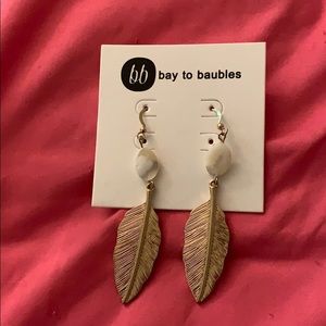 Feather statement earrings- never worn